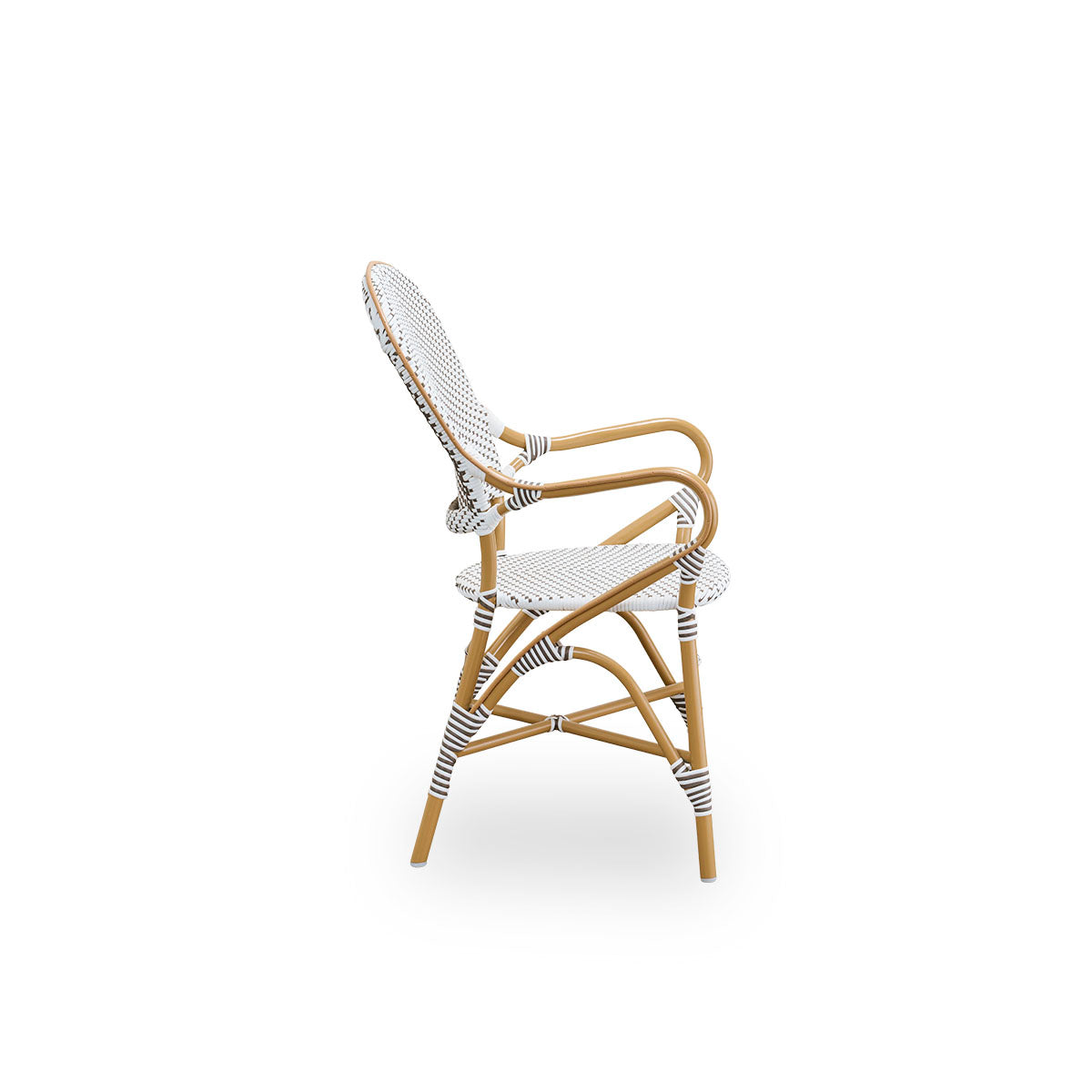 Plain side view of Isabell outdoor dining armchair. Almond colored aluminium frame with seat and backrest made in white ArtFibre with brown dots. Inspired by 1950s bistro design.