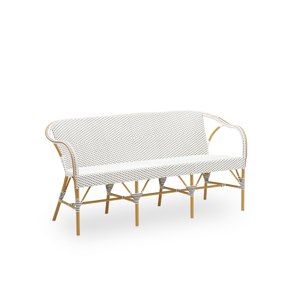 Vista lateral del banco exterior Madeleine, con estructura almendra y ArtFibre blanco con puntos capuchino. Parte de la colección Alu-Affäire, inspirada en diseños de Sika-Design de los 50 y bistrós parisinos. Para todo el año.