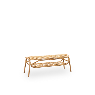Vista lateral del banco Machiya, diseñado por Jin Kuramoto e inspirado en las tradicionales casas Machiya japonesas. Hecho a mano con ratán de alta calidad de Indonesia. Longitud 120 cm.