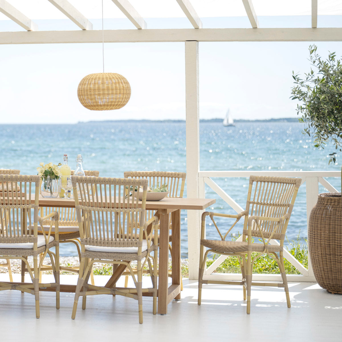 Silla de brazos para comedor Piano Exterior