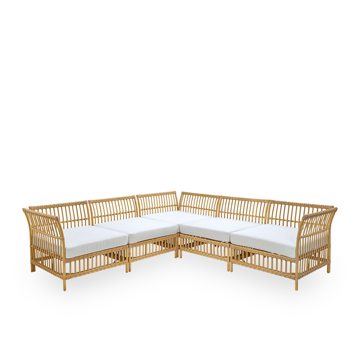 Side view of Maggie outdoor sofa corner module in Natural color presented with white seat and back cushion. Aluminium frame with handpainted rattan look with ArtFibre windings.