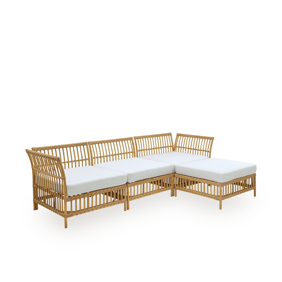 Plain side view of Maggie outdoor sofa corner module in Natural color presented with white seat and back cushion. Aluminium frame with handpainted rattan look with ArtFibre windings.