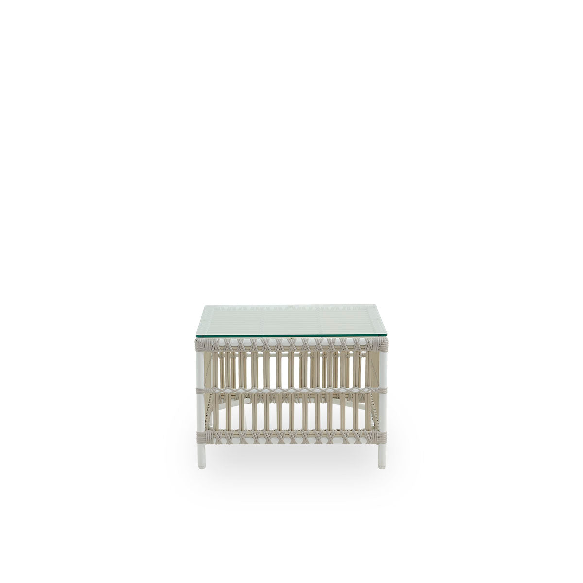 Side view of The Caroline Exterior side table in dove white. This is a small, elegant outdoor side table that offers unique strength and durability. The frame of the side table is made from aluminum with elegant ArtFibre details.